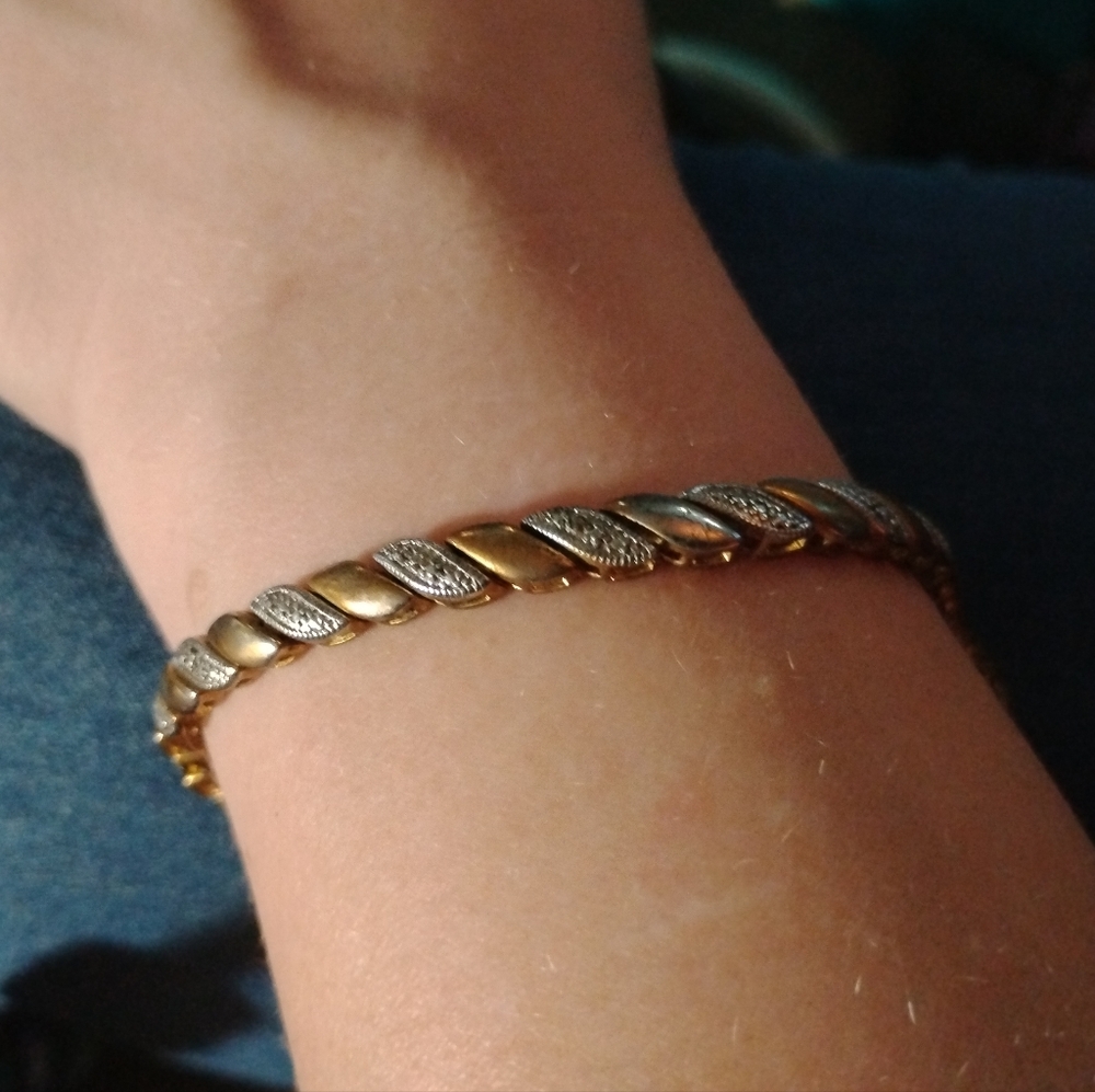 Elegant Gold and Silver Twisted Bracelet